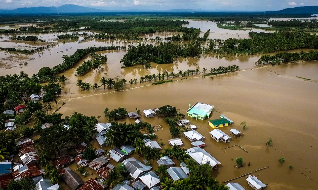 A file photo taken on December 23, 2017 shows a general view of the flooded Municipality of Kabacan, North Cotabato, on the southern island of Mindanao, after Tropical Storm Tembin dumped torrential rains across the island. A single degree of warming since the industrial revolution has already boosted the frequency and intensity of heat waves, droughts and tropical storms. Photo: Ferdinandh Cabrera/AFP