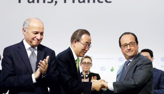 French President Francois Hollande (right) shakes hands with UN Secretary-General Ban Ki-moon during the final session of the COP21 climate change conference in Le Bourget, near Paris, on Saturday. AFP